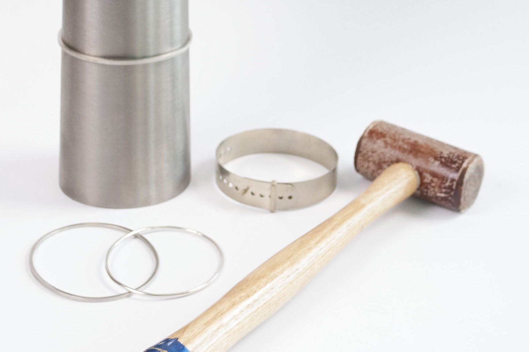 Tools and materials used to make a silver bangle